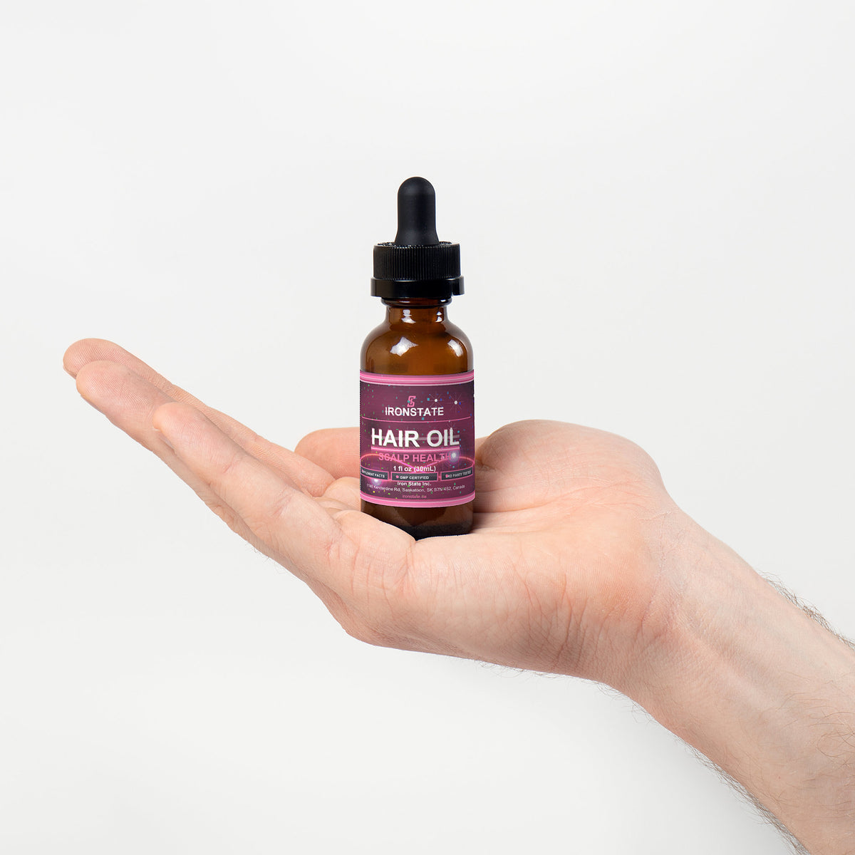 IRONSTATE Hair Oil for Scalp Health and Hair Growth - logo close-up